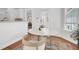 Breakfast nook with hardwood floors and a view of the kitchen and backyard at 1300 Carol Oaks Dr, Mount Pleasant, SC 29466