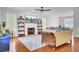 Comfortable living room featuring a fireplace, ceiling fan, and hardwood floors at 1300 Carol Oaks Dr, Mount Pleasant, SC 29466