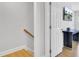 View of stairway with neutral decor leading to an upstairs landing and additional rooms at 1300 Carol Oaks Dr, Mount Pleasant, SC 29466