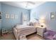 Charming bedroom with light-blue walls, a cozy single bed, and playful decor at 1403 Thin Pine Dr, Johns Island, SC 29455