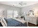 Comfortable primary bedroom featuring a large bed, nightstands, and plenty of natural light at 1403 Thin Pine Dr, Johns Island, SC 29455