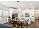 Stylish kitchen and dining area with a cozy ambiance, modern appliances, and ample natural light for comfortable living at 1403 Thin Pine Dr, Johns Island, SC 29455