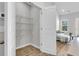 Walk-in pantry with ample storage space and wooden laminate flooring at 151 Cantona Dr, Summerville, SC 29483