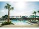 Enjoy the community pool with its palm trees and ample seating, creating a perfect relaxation spot at 1601 Trailmore Ln, Summerville, SC 29486