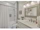 This bathroom features a stylish vanity, shower and bath combination, and a decorative tile floor at 1600 Long Grove Dr # 1621, Mount Pleasant, SC 29464