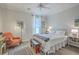 Inviting bedroom with a cozy atmosphere, featuring an accent chair and well-lit window at 1600 Long Grove Dr # 1621, Mount Pleasant, SC 29464