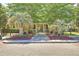 Beautiful clubhouse entrance with mature trees, flowers and well manicured landscaping at 1600 Long Grove Dr # 1621, Mount Pleasant, SC 29464