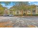 Condominium complex featuring manicured landscaping, ample parking, and a welcoming entrance at 1600 Long Grove Dr # 1621, Mount Pleasant, SC 29464