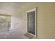 A private entryway featuring a black front door and a covered porch area with a welcome mat at 1600 Long Grove Dr # 1621, Mount Pleasant, SC 29464