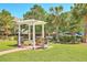 Outdoor grilling area with pergola and stainless steel gas grills for community gatherings at 1600 Long Grove Dr # 1621, Mount Pleasant, SC 29464