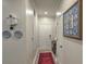 Hallway featuring light walls, hardwood floors, and tasteful decorative elements at 1600 Long Grove Dr # 1621, Mount Pleasant, SC 29464