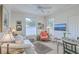 Bright and airy living room with hardwood floors, comfortable seating, and ample natural light at 1600 Long Grove Dr # 1621, Mount Pleasant, SC 29464