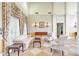 Welcoming lobby features designer wallpaper, plush seating, and an elegant sideboard at 1600 Long Grove Dr # 1621, Mount Pleasant, SC 29464