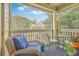Charming screened-in porch featuring comfortable wicker seating and beautiful views of the surrounding nature at 1600 Long Grove Dr # 1621, Mount Pleasant, SC 29464