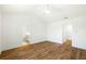 Bright bedroom with ensuite bathroom, ceiling fan and wood flooring at 1630 Balsam St, Charleston, SC 29407