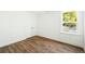Bright bedroom boasts wood floors and closet space at 1630 Balsam St, Charleston, SC 29407