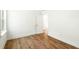Bright bedroom features wood floors and a view outside at 1630 Balsam St, Charleston, SC 29407