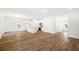 Spacious open-concept area with wood floors seamlessly blending living and dining spaces at 1630 Balsam St, Charleston, SC 29407