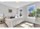 Bedroom featuring plush bedding, windows and hardwood floors at 171 Cantona Dr, Summerville, SC 29483
