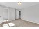 Bright bedroom with neutral carpet and a view to the walk-in closet, perfect blank canvas at 171 Cantona Dr, Summerville, SC 29483