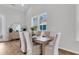 Cozy dining area with a modern table, seating for six, and lots of natural light at 171 Cantona Dr, Summerville, SC 29483