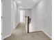 Neutral hallway with carpeted floors, white trim and gray walls at 171 Cantona Dr, Summerville, SC 29483
