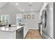 Well-equipped kitchen features stainless steel appliances, ample counter space, and a view into the dining area at 171 Cantona Dr, Summerville, SC 29483
