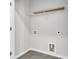 Laundry room with gray tile floors and white walls at 171 Cantona Dr, Summerville, SC 29483