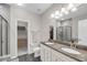 Bathroom features a double sink vanity, a separate toilet area, and a glass-enclosed shower at 1941 Zonny Moss Dr, Johns Island, SC 29455