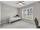 Bedroom with a large window and a ceiling fan; perfect for rest or study at 1941 Zonny Moss Dr, Johns Island, SC 29455