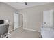Bedroom with a chair, desk, ceiling fan, and neutral paint; perfect for rest or study at 1941 Zonny Moss Dr, Johns Island, SC 29455