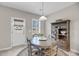 Cozy dining area features a round table with seating for four and a built-in bookcase at 1941 Zonny Moss Dr, Johns Island, SC 29455