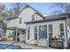 Home backyard featuring in-ground pool, outdoor furniture, patio and well-maintained white siding at 203 Candleberry Cir, Goose Creek, SC 29445