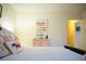 Bedroom features colorful decor, flamingo-themed throw pillows, and colorful wall art at 203 Candleberry Cir, Goose Creek, SC 29445