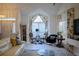 Open living space with bright, natural light, stylish seating, and unique decor at 203 Candleberry Cir, Goose Creek, SC 29445