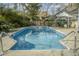 Inviting in-ground pool with clear blue water, surrounded by a concrete patio at 203 Candleberry Cir, Goose Creek, SC 29445