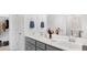 Bathroom featuring dual sinks, modern fixtures, and a clean design, offering convenience and style at 223 Denham St, Summerville, SC 29486