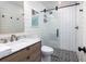 Modern bathroom featuring a walk-in shower with stylish tile and a marble countertop vanity at 29 27Th Ave, Isle of Palms, SC 29451