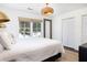 Inviting bedroom with a queen bed, large windows, and ample closet space at 29 27Th Ave, Isle of Palms, SC 29451