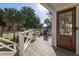Large deck with outdoor seating and access to the home's interior at 29 27Th Ave, Isle of Palms, SC 29451