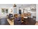 Open concept living space featuring kitchen and living room areas with hardwood floors at 29 27Th Ave, Isle of Palms, SC 29451
