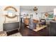 Open concept living space featuring kitchen and living room areas with hardwood floors at 29 27Th Ave, Isle of Palms, SC 29451