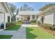 Beautiful backyard with a patio, barbecue grill, and landscaped garden at 299 Bampfield Dr, Mount Pleasant, SC 29464