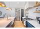 Well-equipped kitchen with stainless steel appliances, white countertops, and stylish blue cabinetry at 299 Bampfield Dr, Mount Pleasant, SC 29464