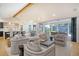 Open concept living room featuring hardwood floors and access to an outdoor patio at 299 Bampfield Dr, Mount Pleasant, SC 29464