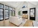 Airy living room with high ceilings, modern design, large windows, and seamless indoor-outdoor flow at 299 Bampfield Dr, Mount Pleasant, SC 29464