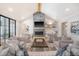 Cozy living room featuring a modern fireplace, stylish seating, and hardwood floors at 299 Bampfield Dr, Mount Pleasant, SC 29464