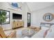 Modern living room featuring vaulted ceilings, stylish decor, comfortable seating, and natural light at 299 Bampfield Dr, Mount Pleasant, SC 29464