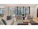 Cozy living room with large glass doors, neutral decor, and comfortable seating arrangement at 299 Bampfield Dr, Mount Pleasant, SC 29464
