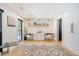 Well-lit office space with custom built-in desk, a patterned rug, and modern decor accents at 299 Bampfield Dr, Mount Pleasant, SC 29464